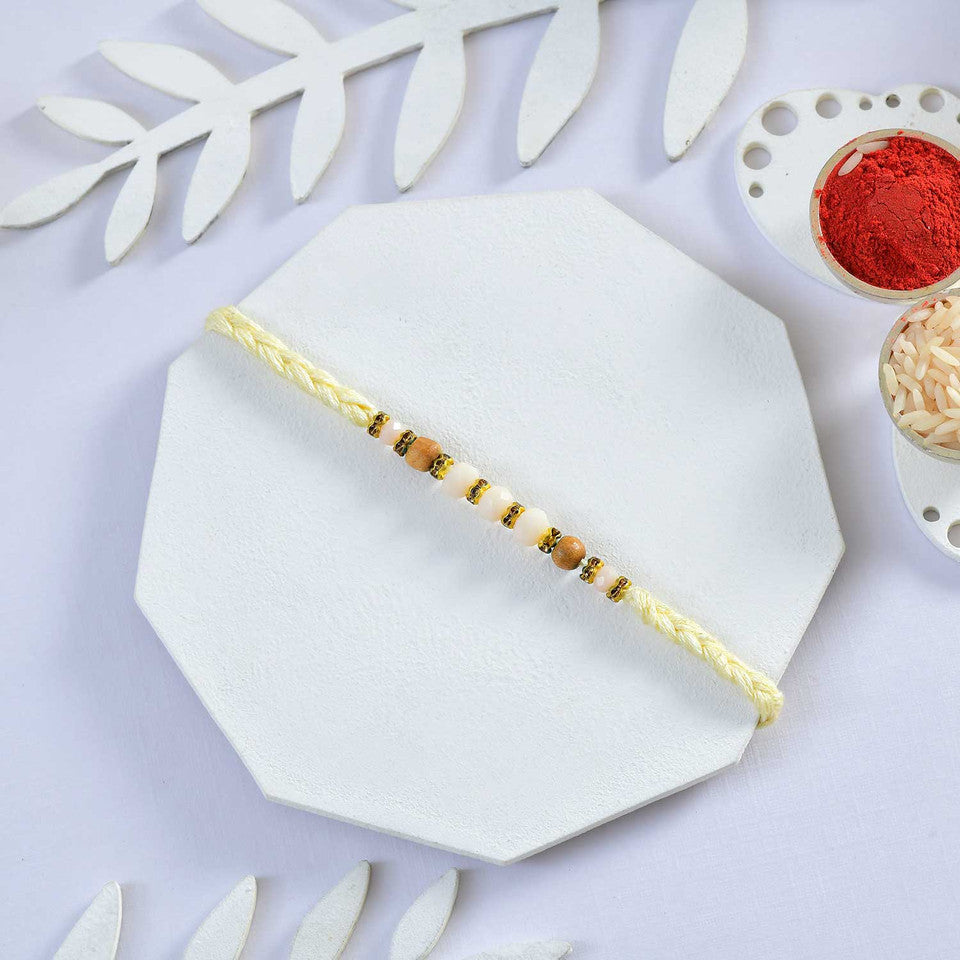 T4 Jewels Golden Colour Rakhi With 4 Pcs Ferrero Rocher Pack (Gift)-SR1 Rakhi T4 Jewels