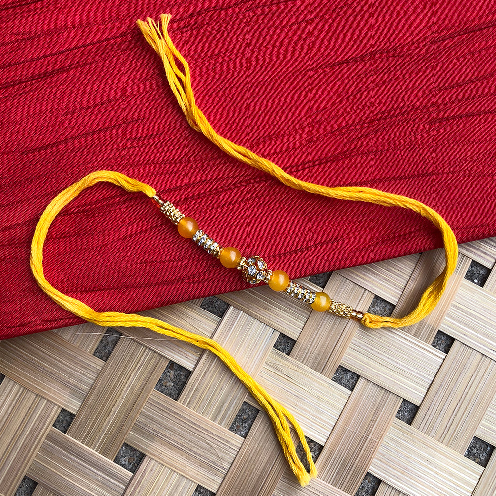 T4 Jewels Elegant Yellow Thread Rakhi with Stone Beads for Brother 🌞 - SR45 Rakhi T4 Jewels