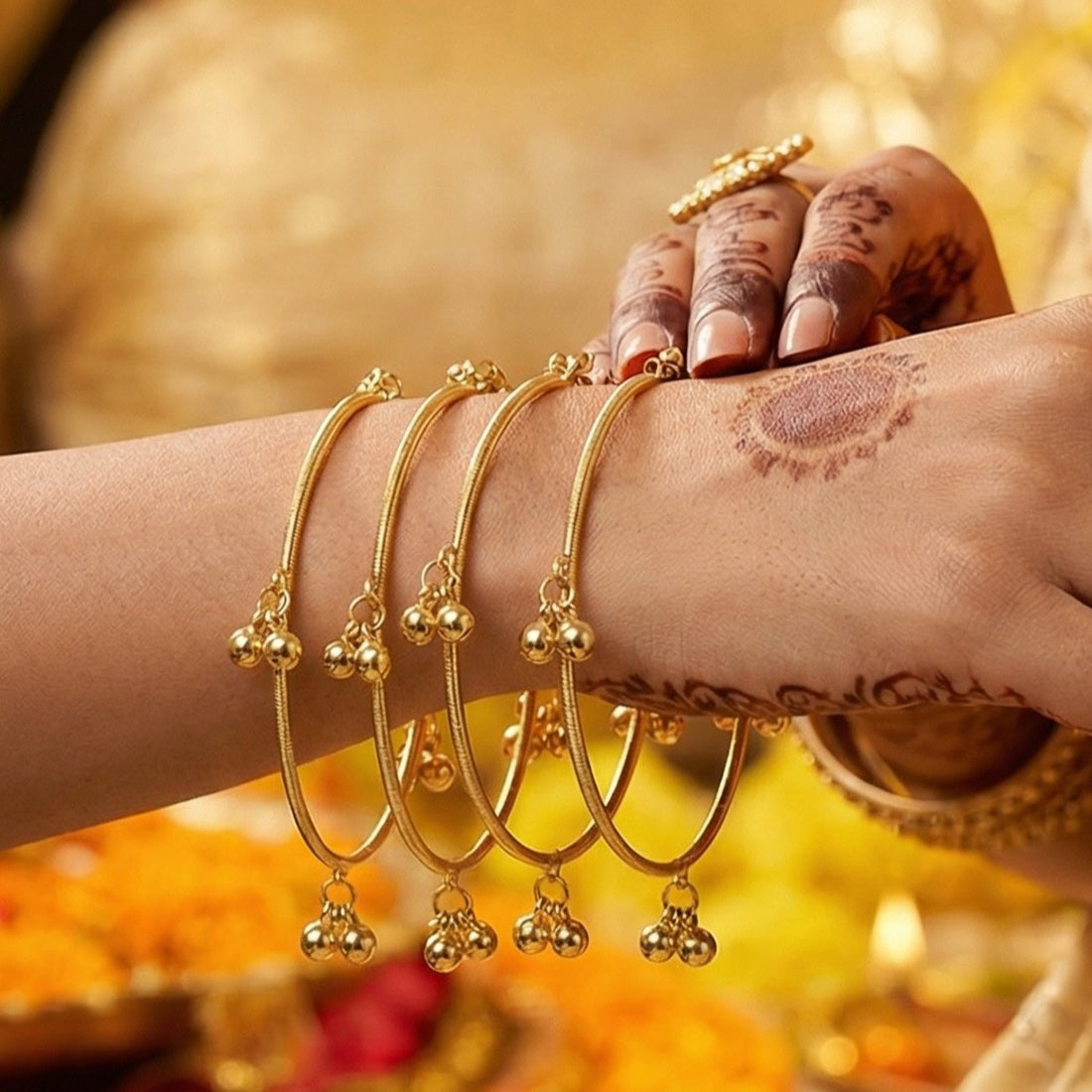 Radiant Gold-Finished Ghungroo Charm Bangles for Festive Wear