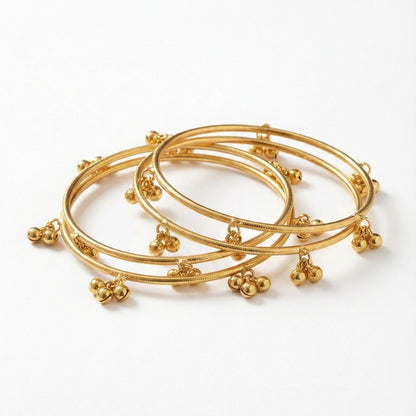 Radiant Gold-Finished Ghungroo Charm Bangles for Festive Wear